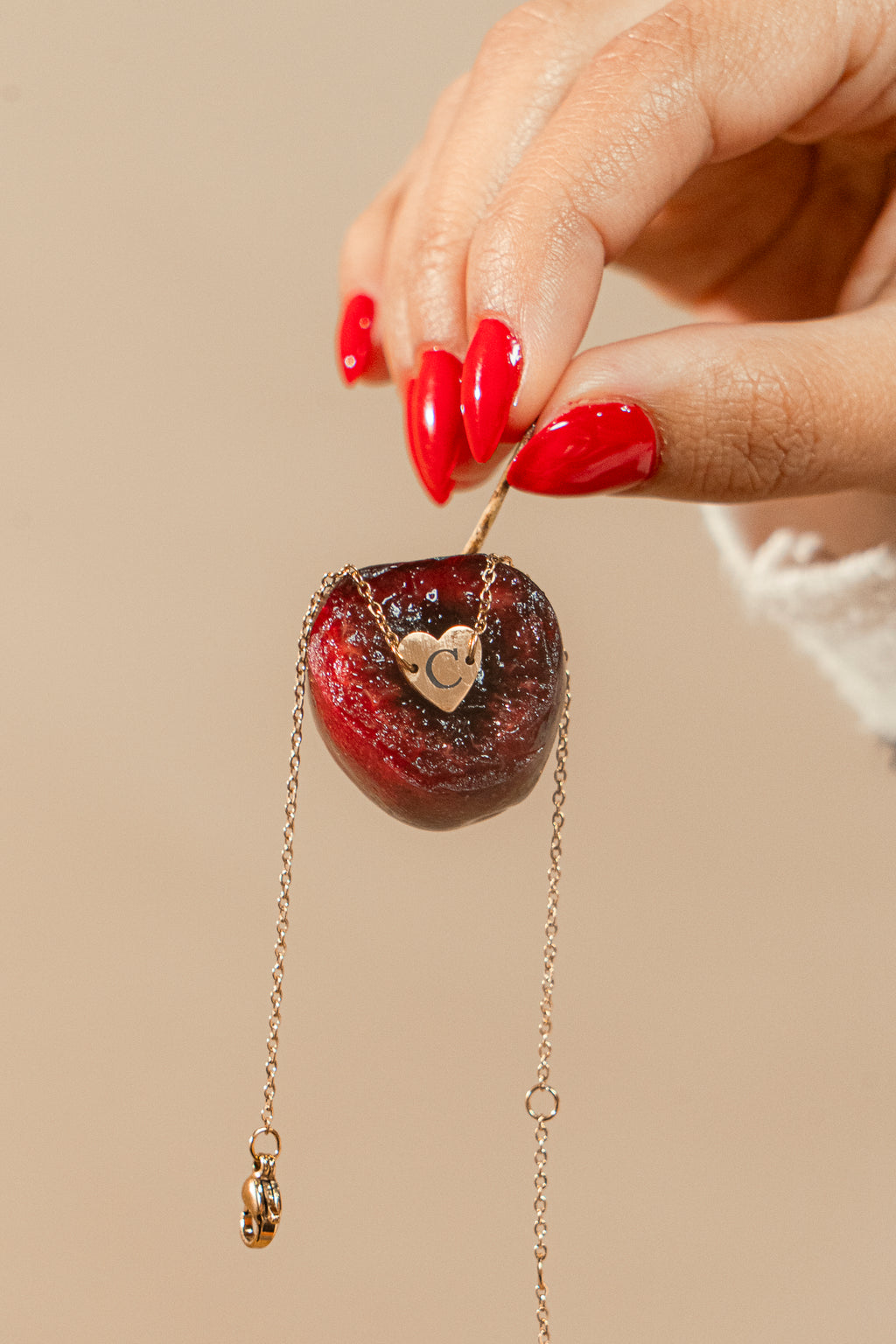 Pulsera con corazón e inicial